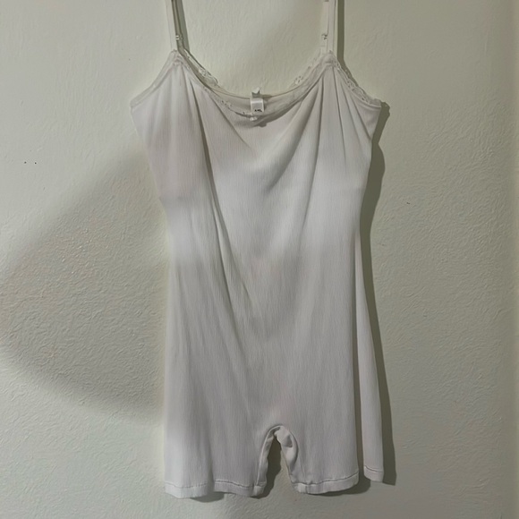 SKIMS Pants - soft lounge lace onesie cream colored. 🤍